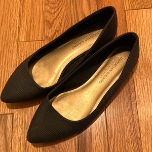 Black pointed leather flats